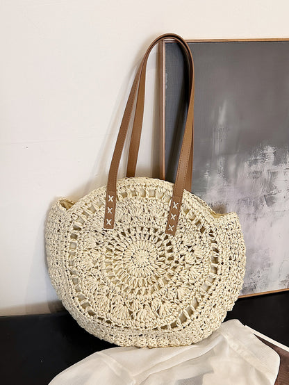 Round hollowed-out straw-woven bag, French single-shoulder hand-held woven bag